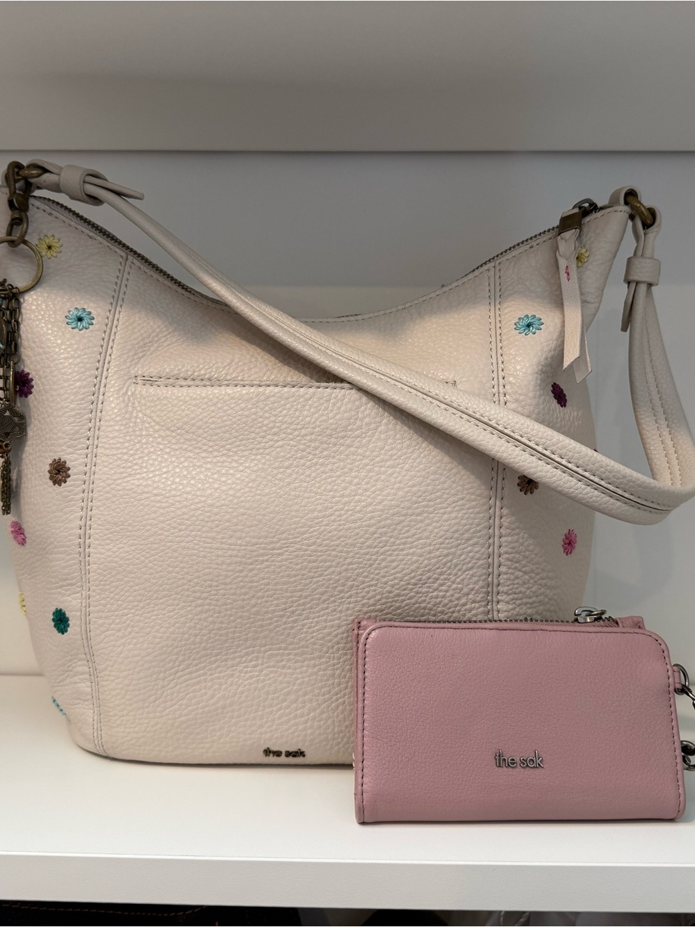 The Sak Sequoia hobo bag with pink wallet